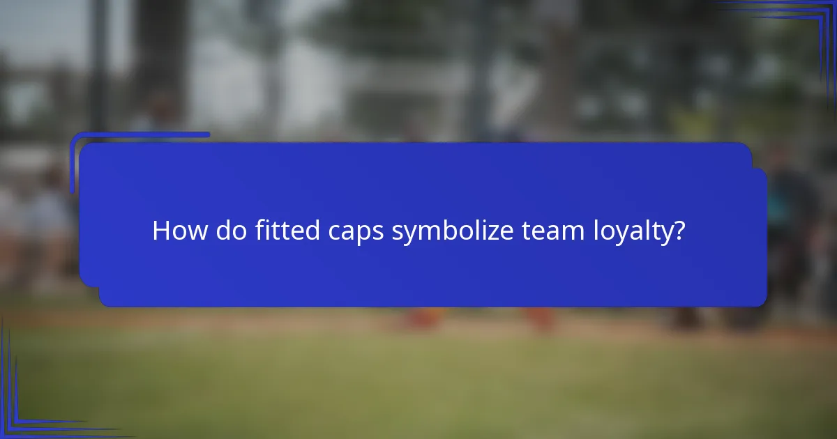 How do fitted caps symbolize team loyalty?
